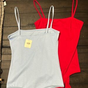 2 Free Prople bodysuits. Size Small